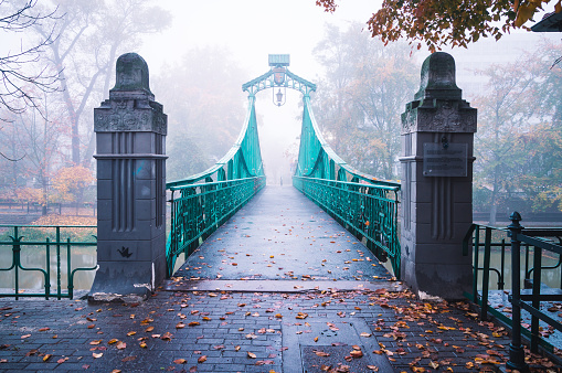Opole, Poland – October 29, 2020: old bridge in the city early morning in fog