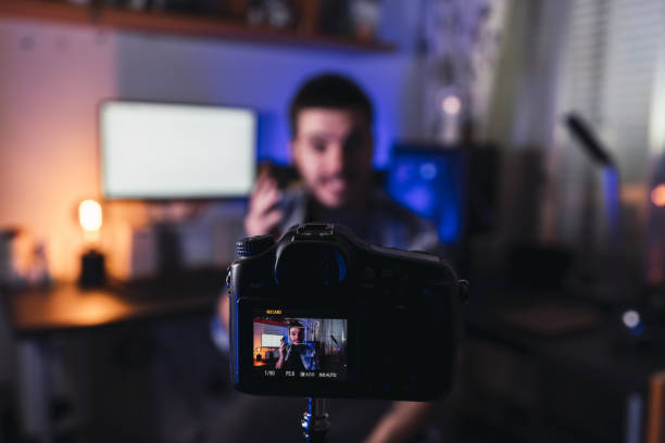 istock Young video blogger recording a vlog about technology at home 1438118442