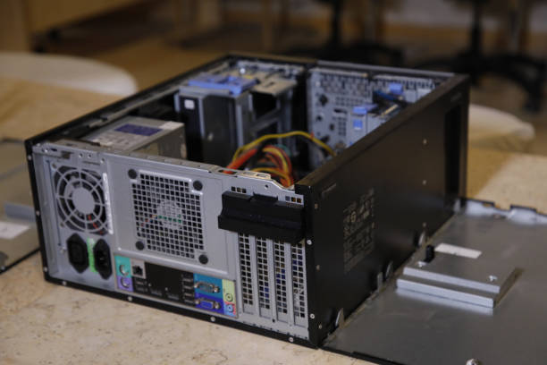 istock open inside the computer with the motherboard, CPU, graphic card, computer wiring, RAM 1438119199