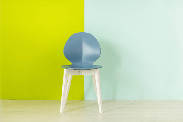 istock Modern blue chair in front of a blue green background 1438120426