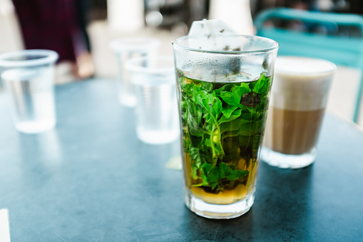 Herb tea on the table in coffee shop in Jaffa, Israel.