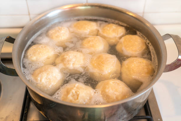 istock Cooking apricot dumpling in domestic kitchen 1438120703