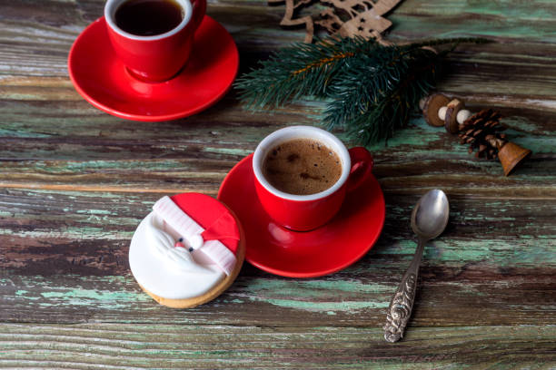 istock Christmas biscuits and a red cup of coffee close-up 1438120715