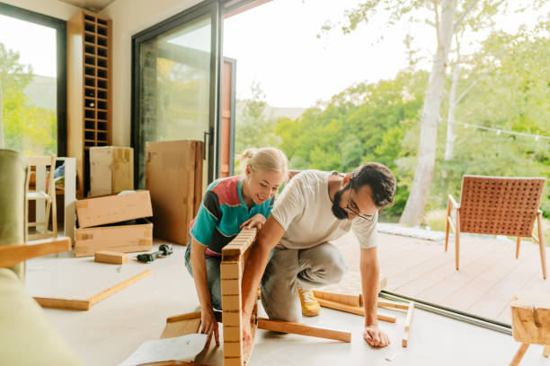 istock Assembling furniture for our new home 1438122122