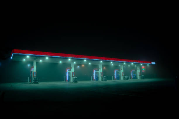 istock Empty Gas Station On a Foggy Night 1438122300
