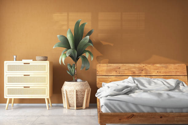 istock Cozy Beige Bedroom with a Wooden Bed 1438123468