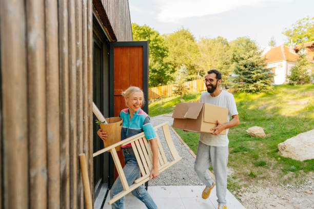 istock Young couple moving into a new home 1438123680
