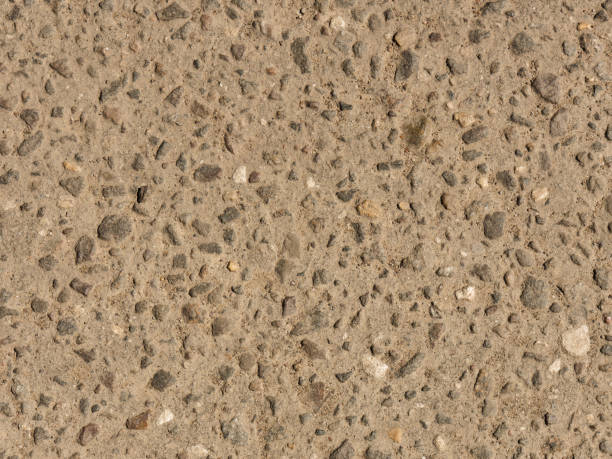 istock Background from old asphalt in sun day yellow color. Top view. Macro 1438123733