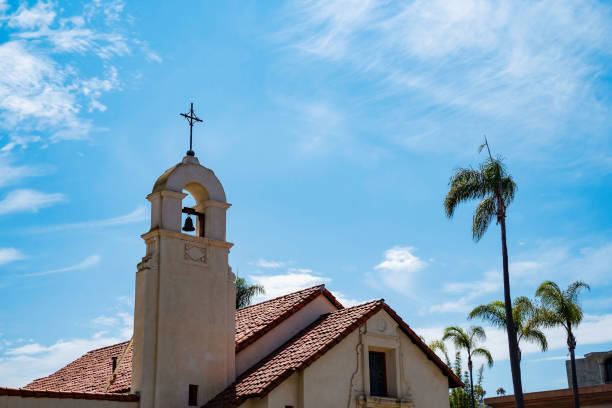 istock church bell tower with rpalm trees 1438127463
