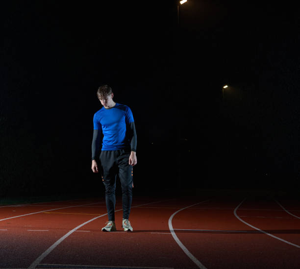 istock athlete training in the rain athletics running 1438131320