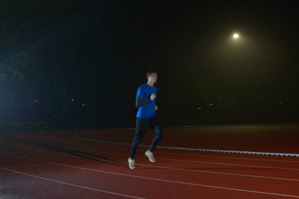 istock athlete training in the rain athletics running 1438131334