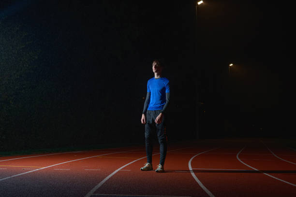 istock athlete training in the rain athletics running 1438131336