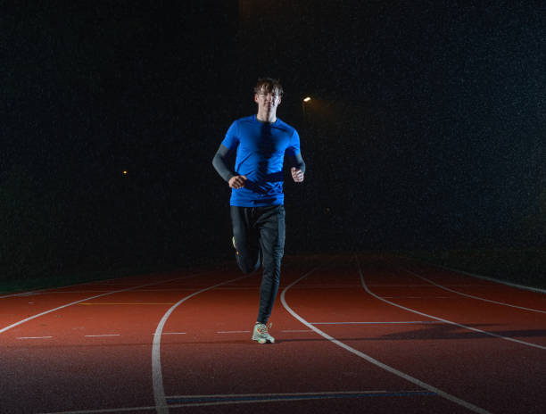 istock athlete training in the rain athletics running 1438131358