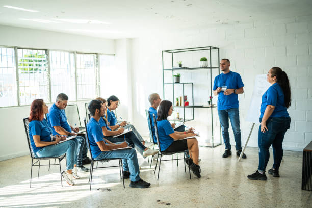 istock Volunteers doing a presentation on a community center 1438132697