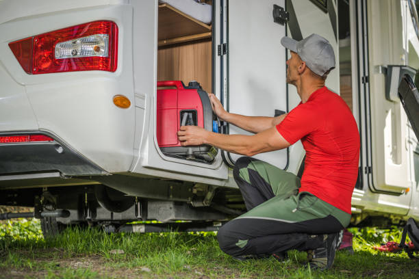 istock Men Removing Portable Gas Generator From His Camper Van RV Storage Area 1438135358