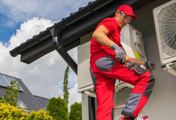 istock Professional HVAC Worker Maintain Heat Pump Repair 1438135397