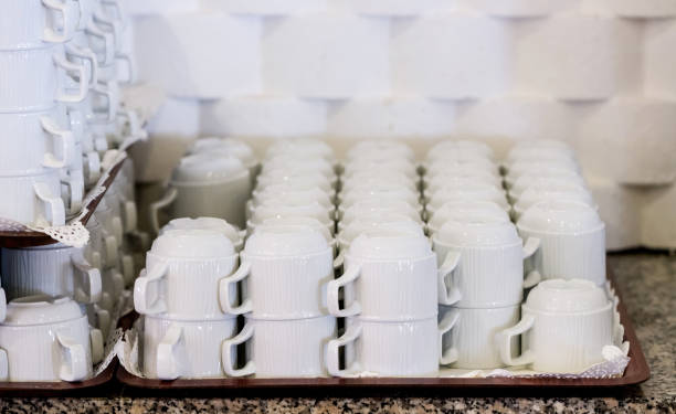 istock Set of white coffee cups on the tray 1438135705
