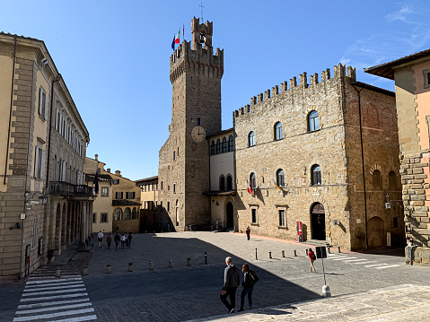 Palazzo dei Priori, Arezzo Town Hall, Tuscany, Italy. The Palazzo dei Priori, dating back to the 14th century, was the seat of the city’s highest powers in the Early Middle Ages. It still houses the city hall. Piazza della Liberta square view in Arezzo.