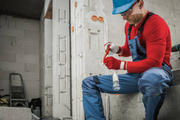 istock Electrician Preparing Light Point Inside Newly Developed Concrete Bricks House 1438141437