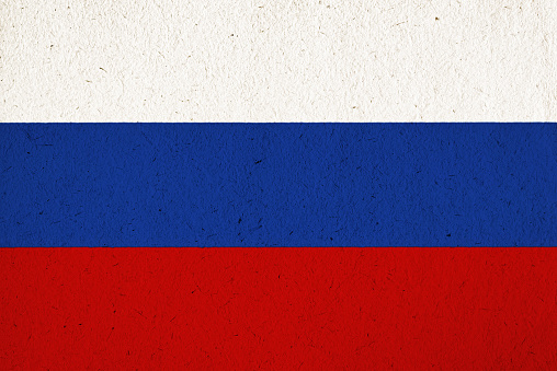 Flag of Russia, on richly textured paper.