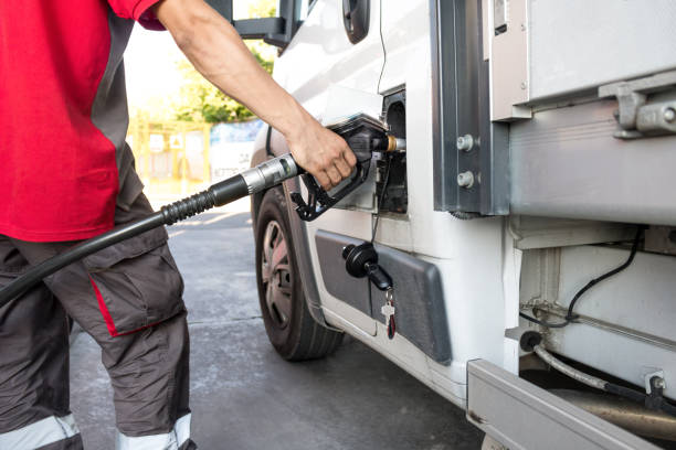 Truck refueling on a petrol station stock photo