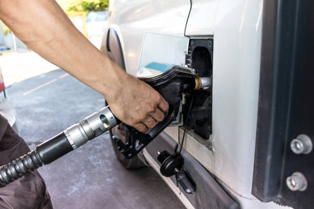 istock Truck refueling on a petrol station 1438142841