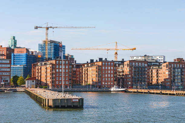 istock Construction of a residential area by the water 1438142917