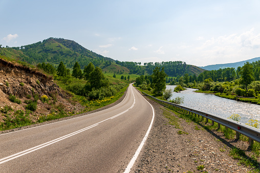 Beautiful empty road to the mountains