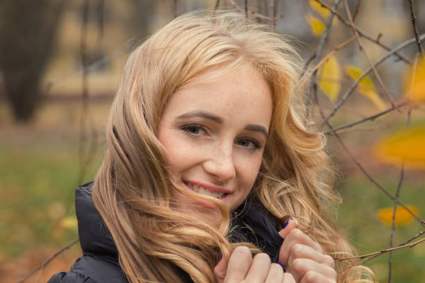 istock pretty happy woman 1438143664