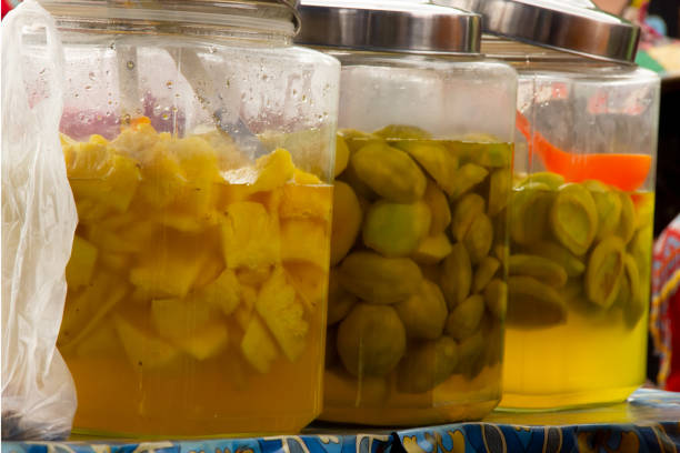 istock pickles mango and pineapple placed in a jar, selling street vendors 1438145749