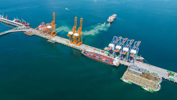 istock Cargo Container Ship Running Out from cargo Shipyard Bridge Container Sea Port logistics and transportation. International Shipping Depot Customs Port for import export trade Transport Business shipping. 1438146182