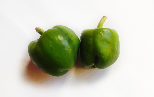 Green capsicum in isolated background.
