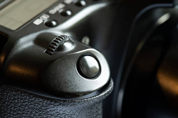istock Simple generic photo camera shutter release button, object detail, macro, extreme closeup, nobody. Photography equipment symbol, photographing abstract concept, nobody, no people, part of a camera 1438149797