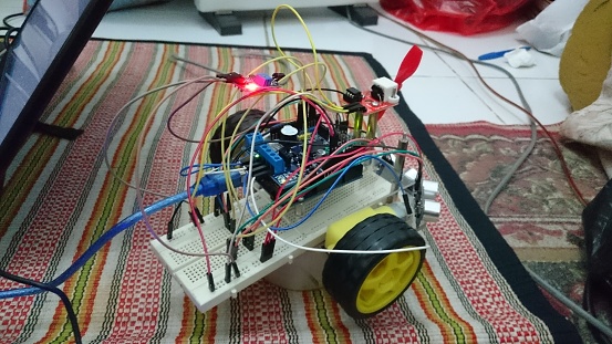 Working on prototype of robotic car with open-source hardware and software platform
