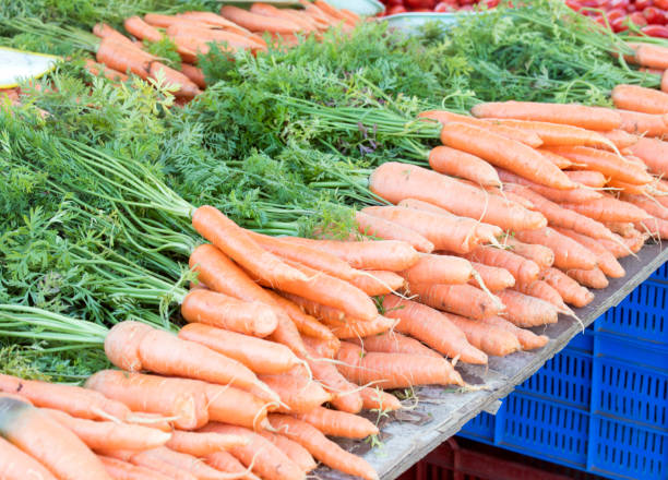 istock Carrots sold at market 1438152700