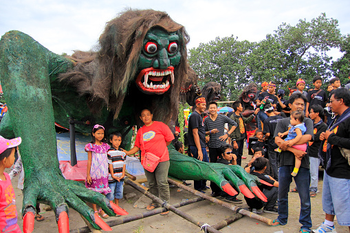 Yogyakarta, Indonesia, May 12, 2014. The giant Buto Ijo doll symbolizing evil is ready to be paraded in the traditional festival of Saparan Bekakak.