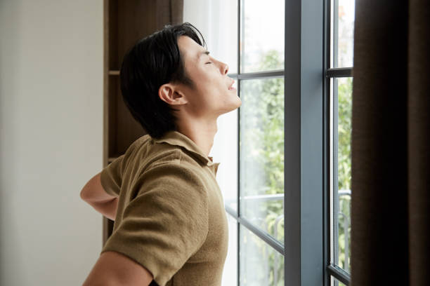 istock Young Man Enjoying New Day 1438155616