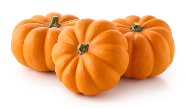 istock Group of three orange pumpkins 1438155961