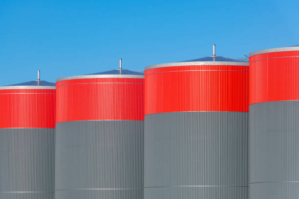 Industrial storage tanks close up creating an abstract line pattern and shape.