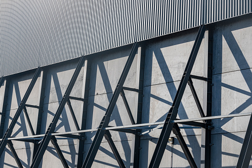 Industrial storage tanks close up creating an abstract line pattern and shape.