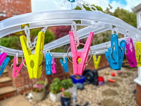 Close-up of pegs on washing line