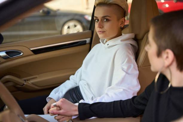 istock Women are sitting in the car in front 1438161753
