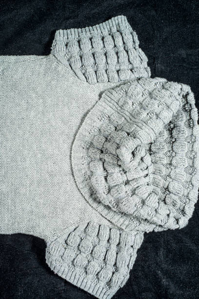 istock Knitted winter warm cloth, jumpers background 1438164809