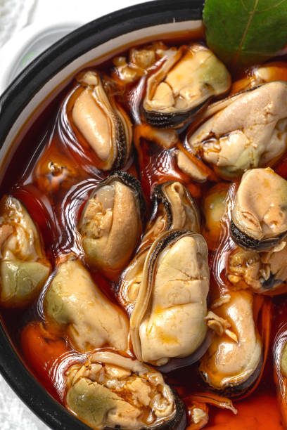 istock Homemade Canned Pickled Mussels snack 1438165259