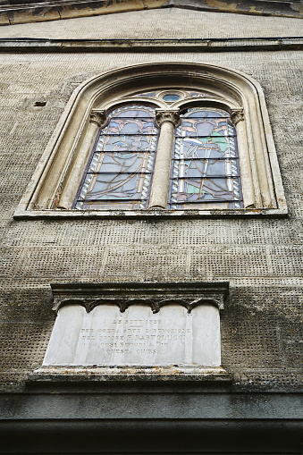 Detail of the facade of the church of San Giovanni Battista in the ancient village of Quota di Poppi, Tuscany, Italy