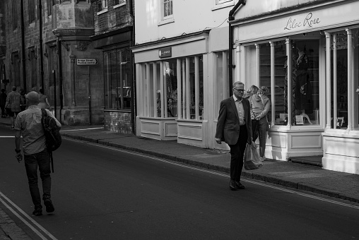 Shoppers on Sidney Street in Cambridge, Cambridgeshire, England, UK.