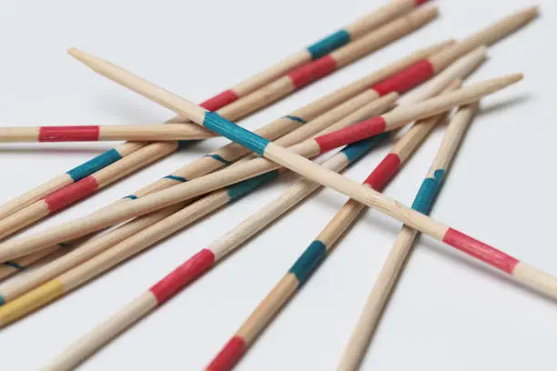 A closeup of Mikado pick-up-sticks, a game of mental and physical skill