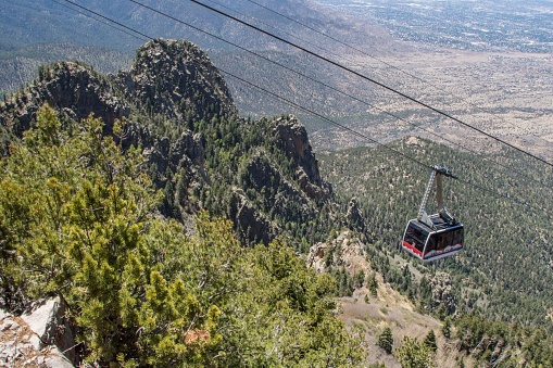 Albuquerque, United States – May 15, 2022: An aerial view of Sandia Peak Tramway in Albuquerque, New Mexico, in sunlight