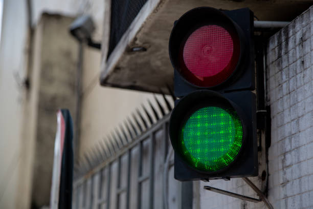 istock Selective focus shot of traffic light with the green lit 1438169073