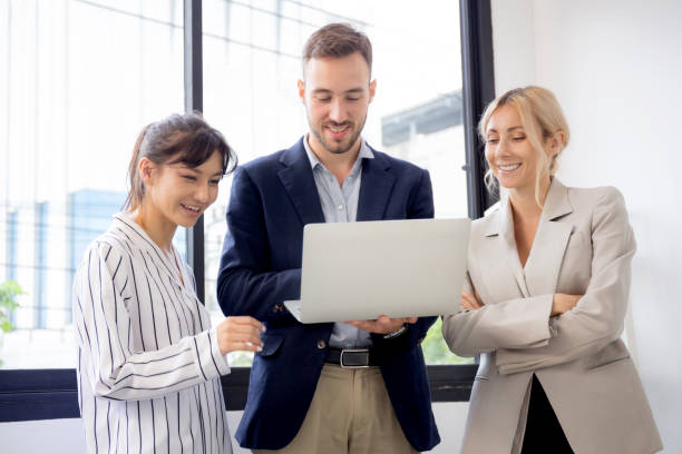 istock Group of team business people using laptop presentation project with colleagues together for planning and strategy marketing at office, manager and employee meeting and brainstorm, business concept. 1438170897